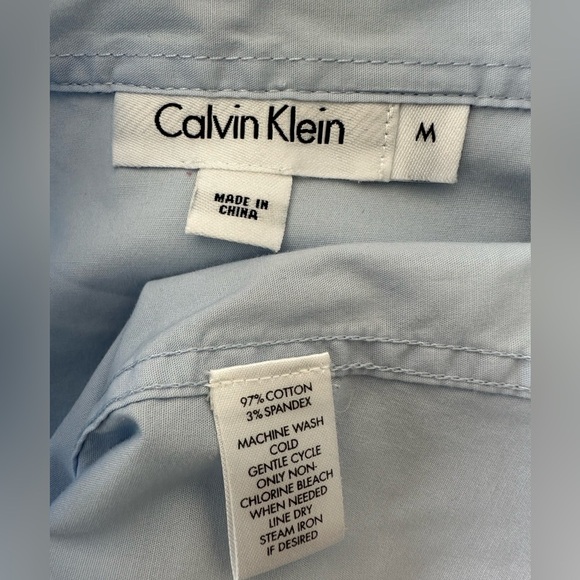 #7)  Calvin Klein  stretches Light blue button down shirt - Picture 5 of 7